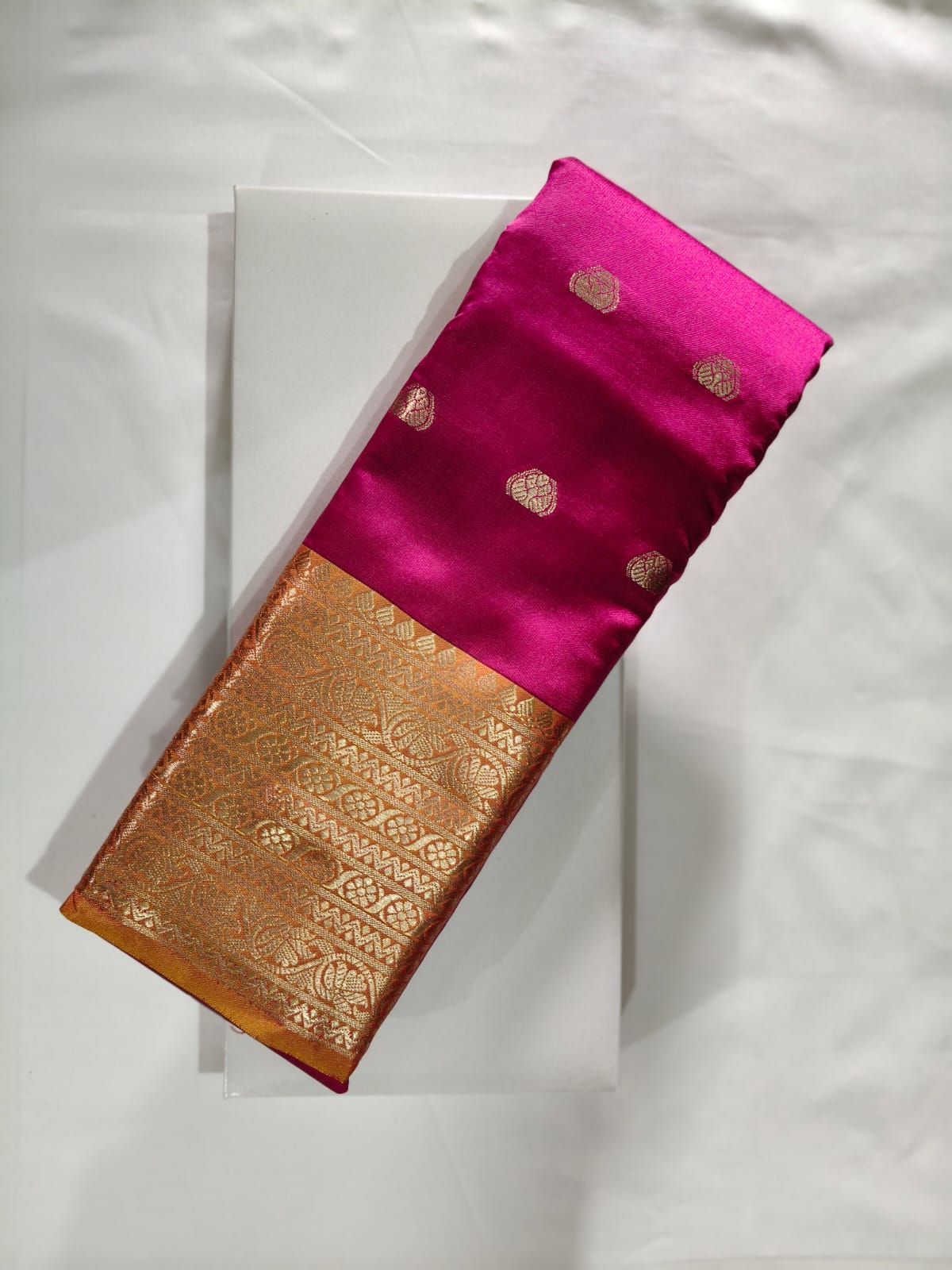 Elegant Dusty Mauve Silk adorned with a Wide, Opulent Gold Zari Weaving Border