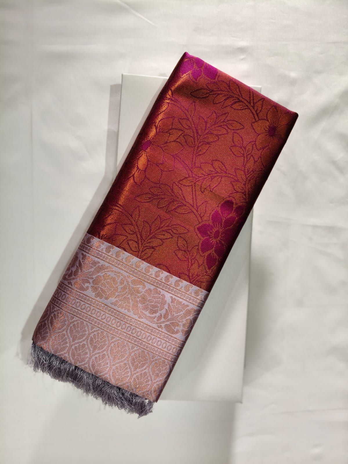 Rich Dual Tone Maroon Kasturi Silk with a Contrasting Silver Toned Border