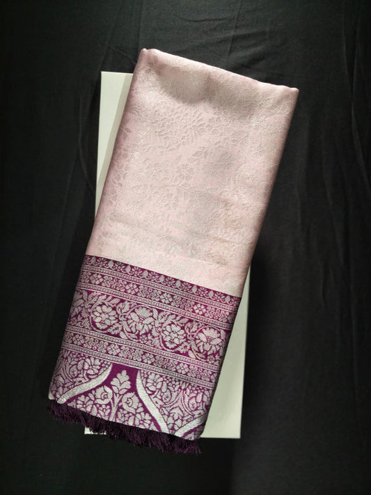 Pink Kasturi Silk with a Deep Purple Border with Heavy Silver Zari Work.