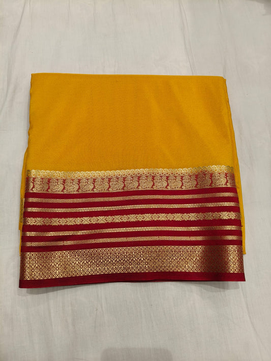 Yellow Crepe Mysore Silk with Red and Gloden Zari border Original - Semi